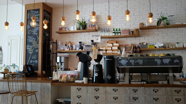 A café counter with coffee equipment