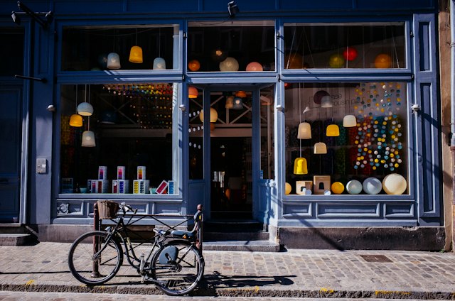 A shop front with a bicycle outside